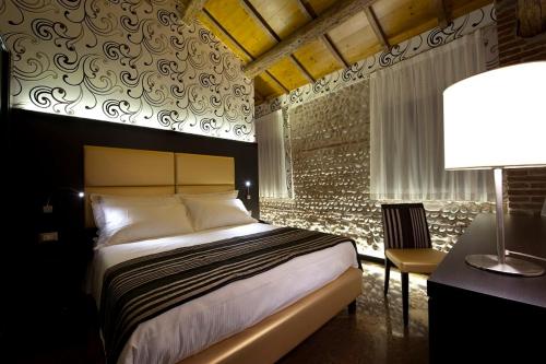 Postel nebo postele na pokoji v ubytování Villa Solaris Hotel & Residence