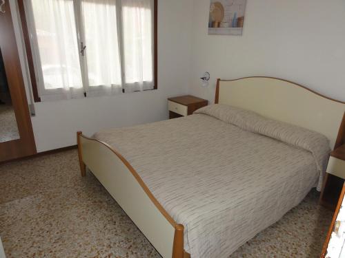 A bed or beds in a room at Villa Letizia