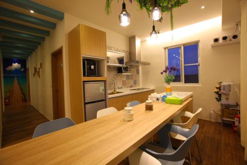 Kuchyň nebo kuchyňský kout v ubytování A-Li A-Li Homestay