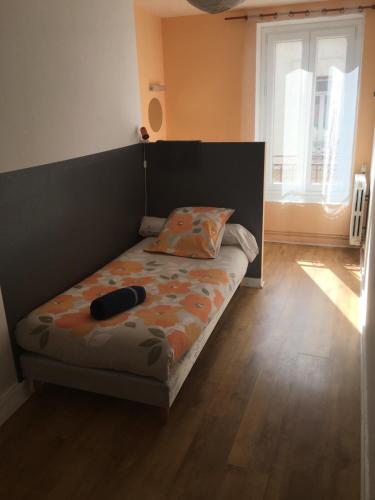 מיטה או מיטות בחדר ב-Auberge Bella Riva