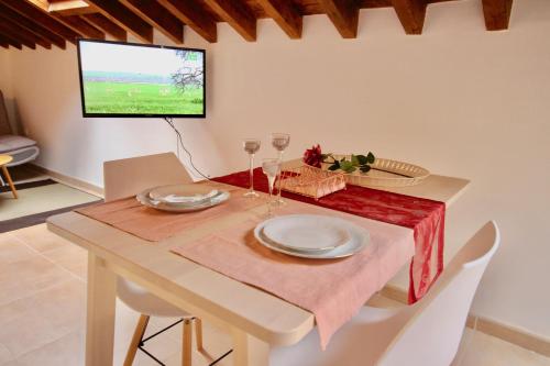 Televízia a/alebo spoločenská miestnosť v ubytovaní carmen apartments
