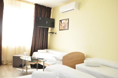 Guest Rooms Simonaにあるベッド