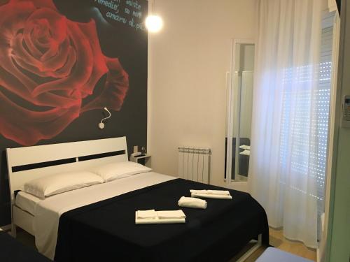 Postel nebo postele na pokoji v ubytování X Hotel
