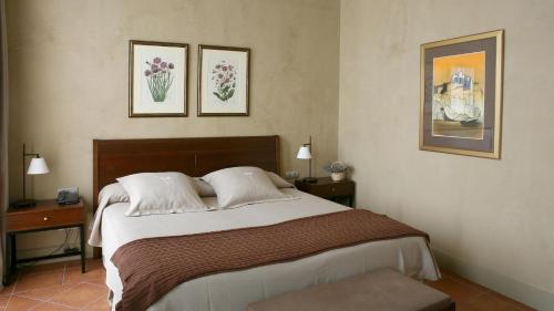 Un ou plusieurs lits dans un hébergement de l'établissement Bremon Boutique Hotel by Duquessa Hotel Collection