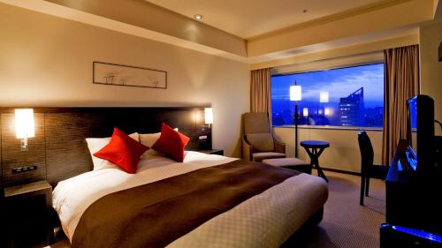 Tempat tidur dalam kamar di Century Royal Hotel Sapporo