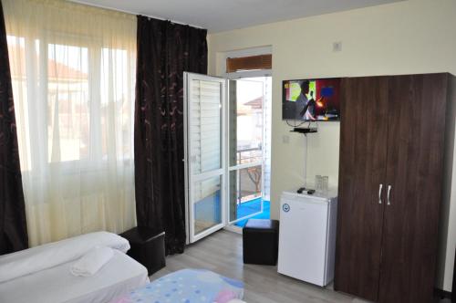 Guest Rooms Simonaにあるベッド