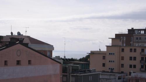 a view of the roofs of buildings in a city at Residence Aprilia in Grado