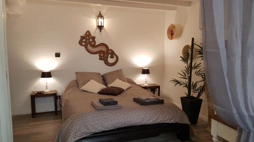 Posteľ alebo postele v izbe v ubytovaní La belmontaise