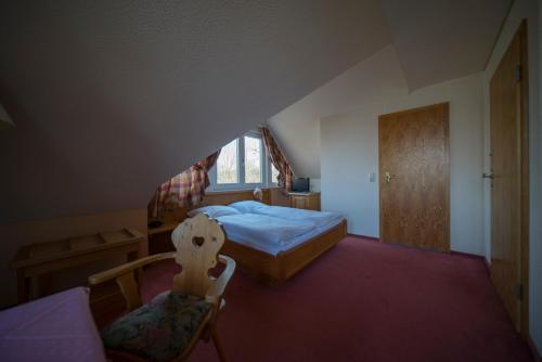 Postel nebo postele na pokoji v ubytování Gasthaus Zum Frohsinn