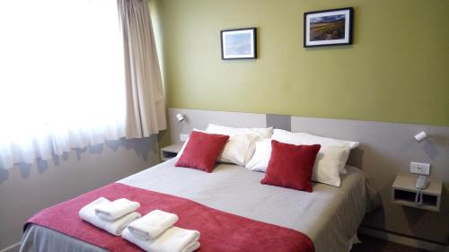 Postel nebo postele na pokoji v ubytování Estepa Hotel