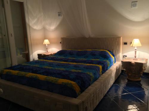 Posteľ alebo postele v izbe v ubytovaní La Perla di Palau