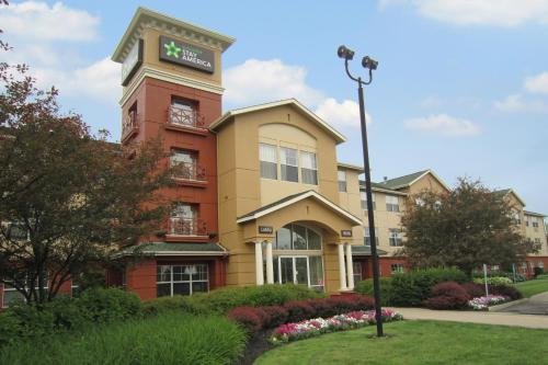 a building with a clock on top of it at Extended Stay America Suites - Columbus - Polaris in Columbus
