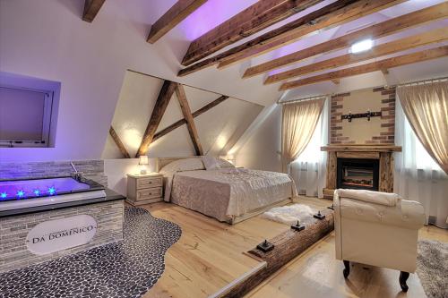 a bedroom with a bed and a fireplace at Da Domenico Am Hagelkreuz in Hilden