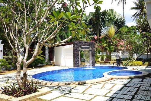 12Haven Stunning Seaside Luxury Villa PD with Kids Poolの敷地内または近くにあるプール