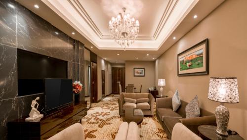 Televisyen dan/atau pusat hiburan di Country Garden Phoenix Hotel Huizhou Huiyang