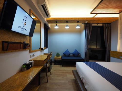 Ps Sriphu Hotelにあるテレビまたはエンターテインメントセンター