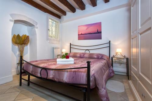 Ein Bett oder Betten in einem Zimmer der Unterkunft Biennale Ca Dario