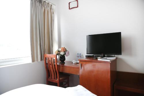 Μια τηλεόραση ή/και κέντρο ψυχαγωγίας στο V-Studio Apartment 3