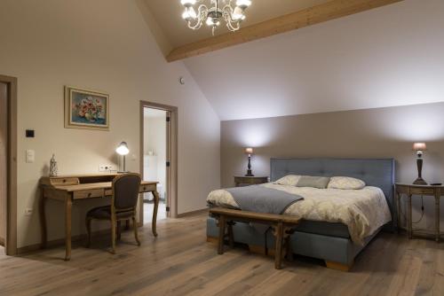Cama o camas de una habitación en B&B De Windheer