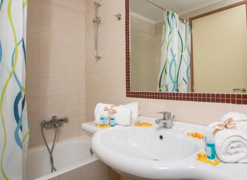 Ванная комната в Hotel Tolo