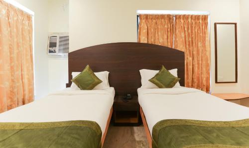 Postel nebo postele na pokoji v ubytování Itsy Hotels Hill View Ex