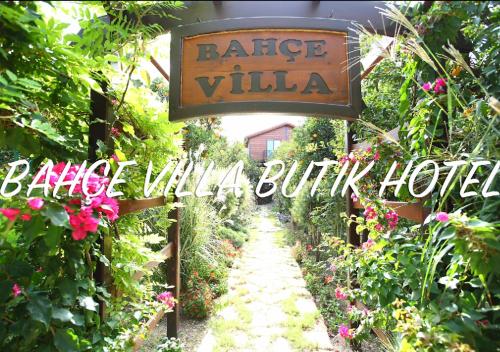 a sign that readsridge villa in a garden at Bahçe Villa in Cıralı