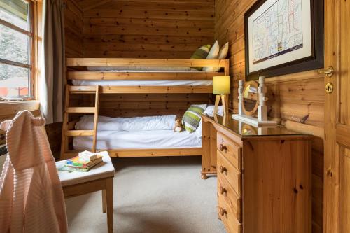 Ένα ή περισσότερα κρεβάτια σε δωμάτιο στο The Lodges at Artlegarth