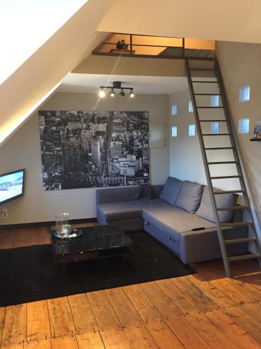 Ruang duduk di N9 Appartement de Charme