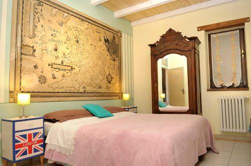 Tempat tidur dalam kamar di B&b San Nicola