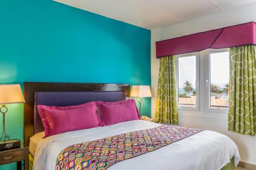 Cama ou camas em um quarto em MVC Eagle Beach