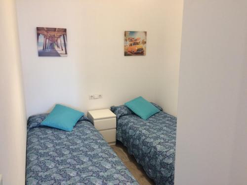 Posteľ alebo postele v izbe v ubytovaní Apartamento faro Puerto Sherry