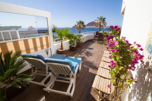 
A balcony or terrace at BEACH-LOFT-NATALIIA - by MEDANO4YOU
