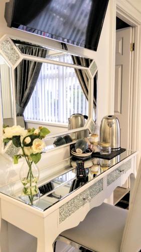 a kitchen with a counter with pots and pans at Number 4 in Derry Londonderry