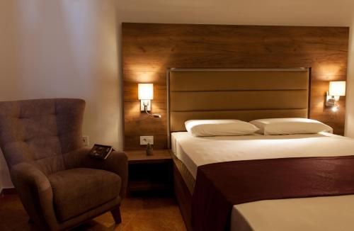 Ένα ή περισσότερα κρεβάτια σε δωμάτιο στο Guest House Pasha