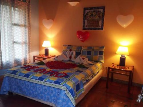 Ένα ή περισσότερα κρεβάτια σε δωμάτιο στο Hotel Villa Paz