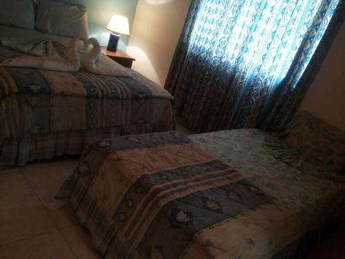 Ένα ή περισσότερα κρεβάτια σε δωμάτιο στο Hotel Villa Paz