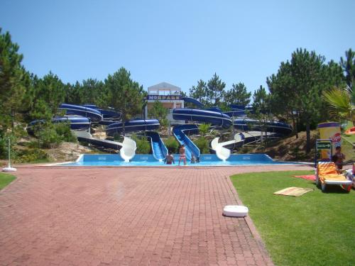 a large water park with a water slide at Nazaré Villa North Wave in Nazaré