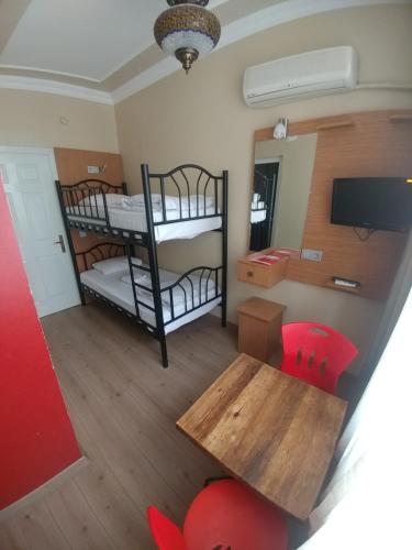 Cama o camas de una habitación en Antique Hostel