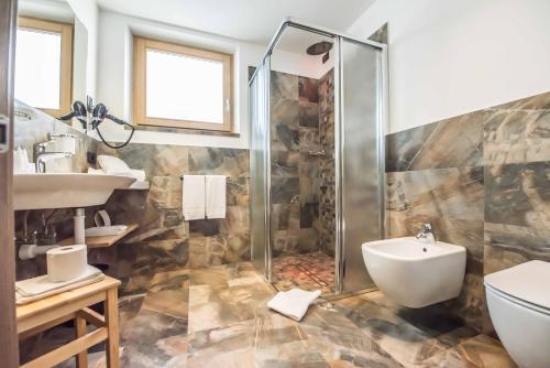 Koupelna v ubytování Hotel Le Alpi