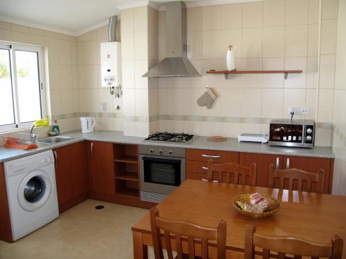 A kitchen or kitchenette at Central Top Floor w/Terrace Oceanview