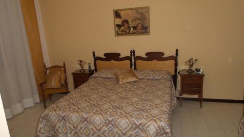 Postel nebo postele na pokoji v ubytování La Casetta sul Corso