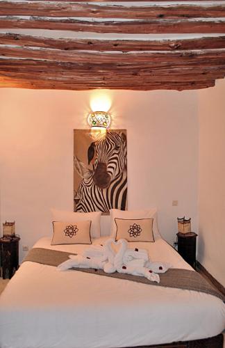Llit o llits en una habitació de Riad Essaada