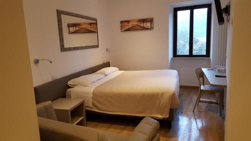 Cama o camas de una habitación en Hotel Pace