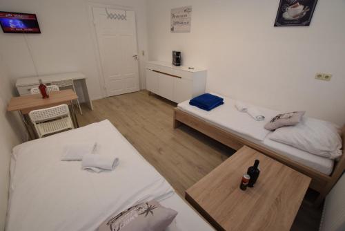 A bed or beds in a room at Monteurzimmer Kirchheim-Teck