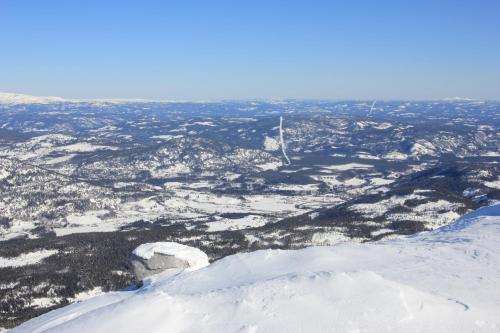 a view from the top of a snow covered mountain at Suigard Veslestugo in Sauland
