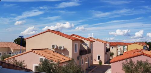 a row of houses in a residential neighborhood at Appart'hotel Résidence La Provence in Istres