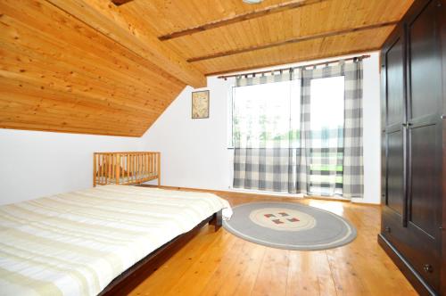 En eller flere senge i et værelse på Casa Mirea