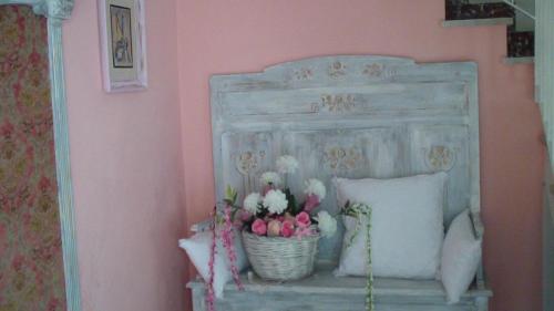 Ένα ή περισσότερα κρεβάτια σε δωμάτιο στο casa Laura