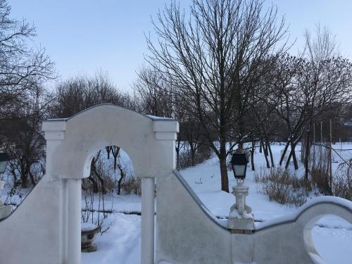 a snow sculpture of a stairway in a park at B&B Villa Pipacs in Feketić