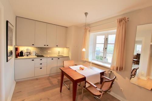 Ulenhof Appartementsにあるキッチンまたは簡易キッチン